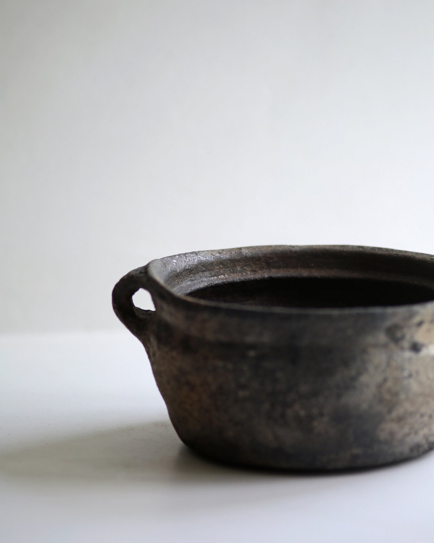 Hand thrown rustic earthenware small clay bowl for display