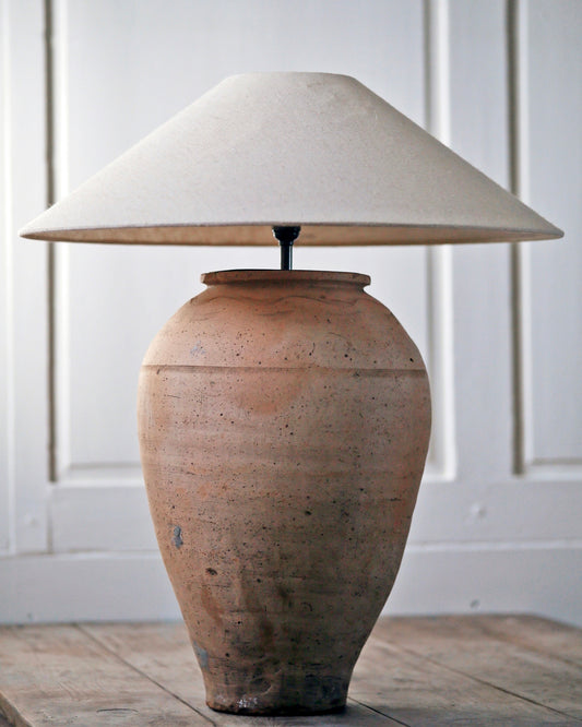 Large pale terracotta olive pot converted to table lamp