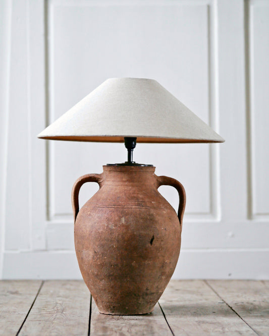 Terracotta table lamp with handles and aged charm