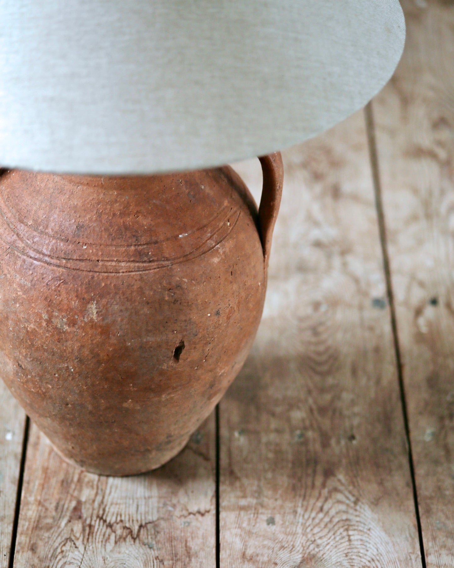 Terracotta coloured clay lamp in original antique condition