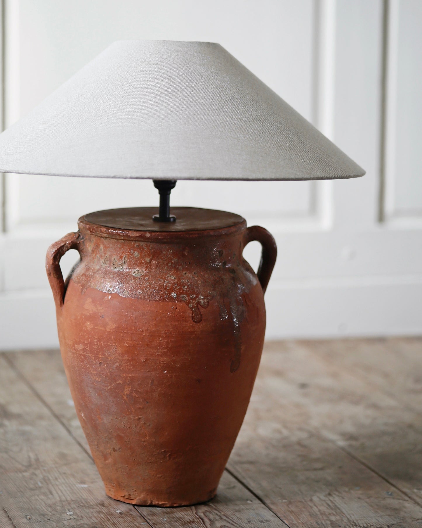 Mediterranean terracotta pot converted to statement lamp
