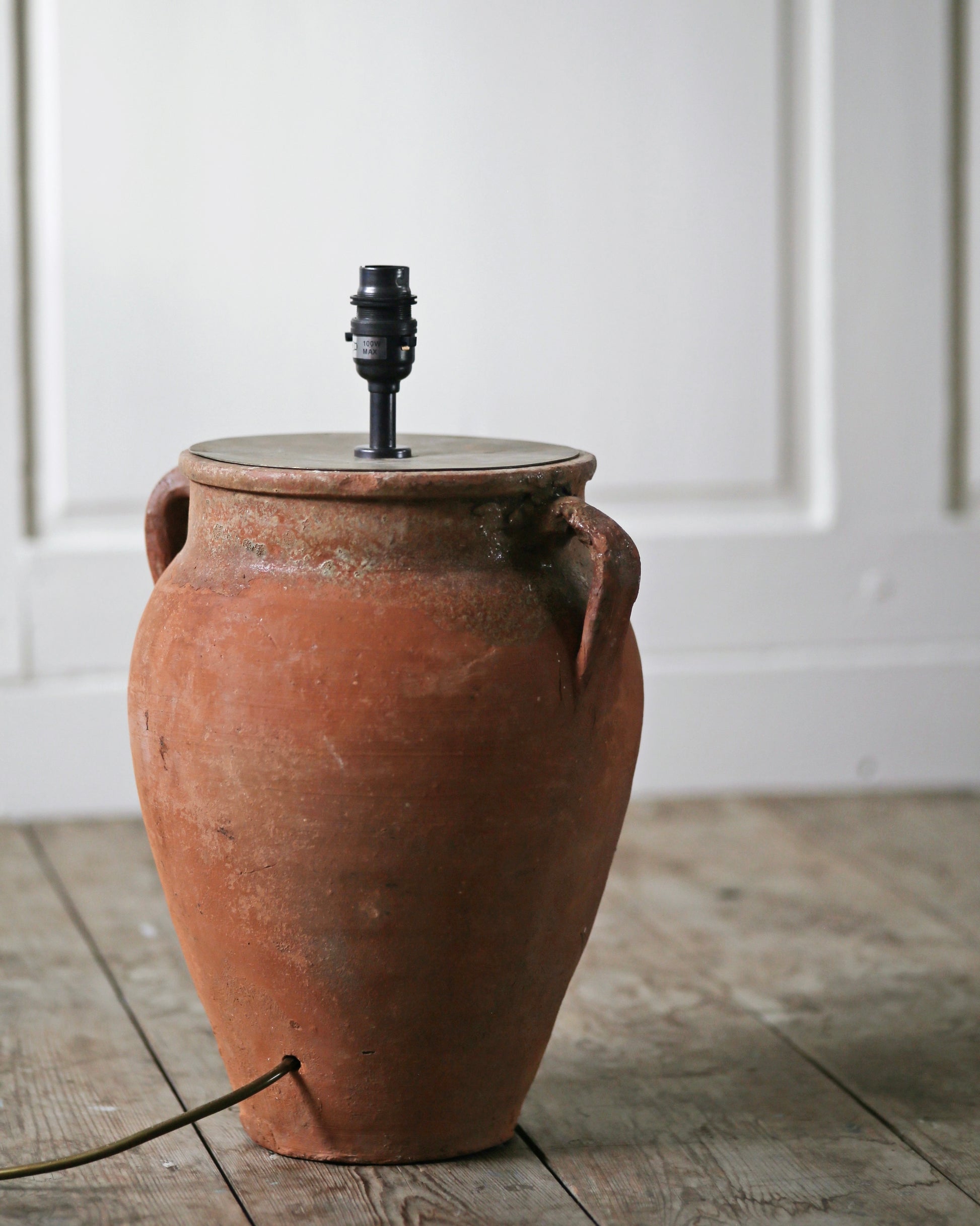 Antique olive jar with handles converted to table lamp