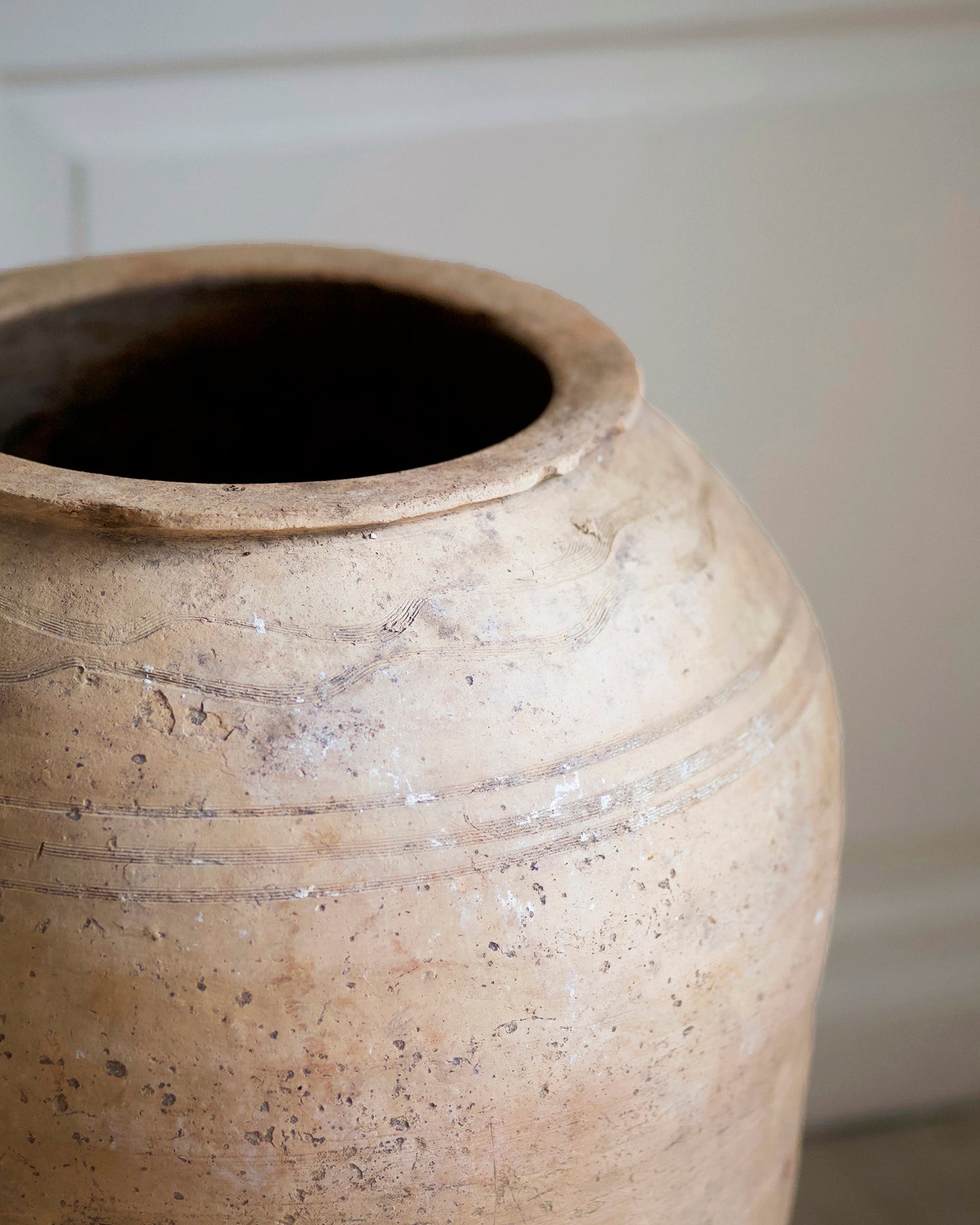 Detailed textured finish of terracotta urn