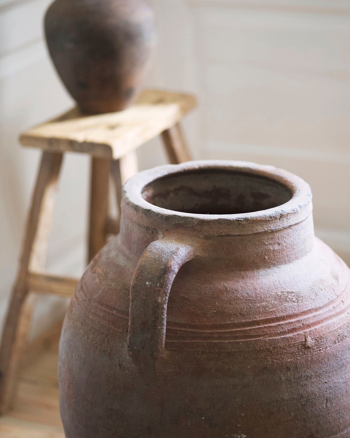 Decorative terracotta details of urn