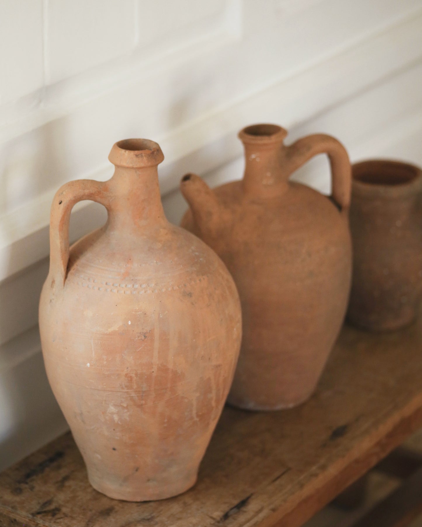 Grouping of earth toned antique clay pots