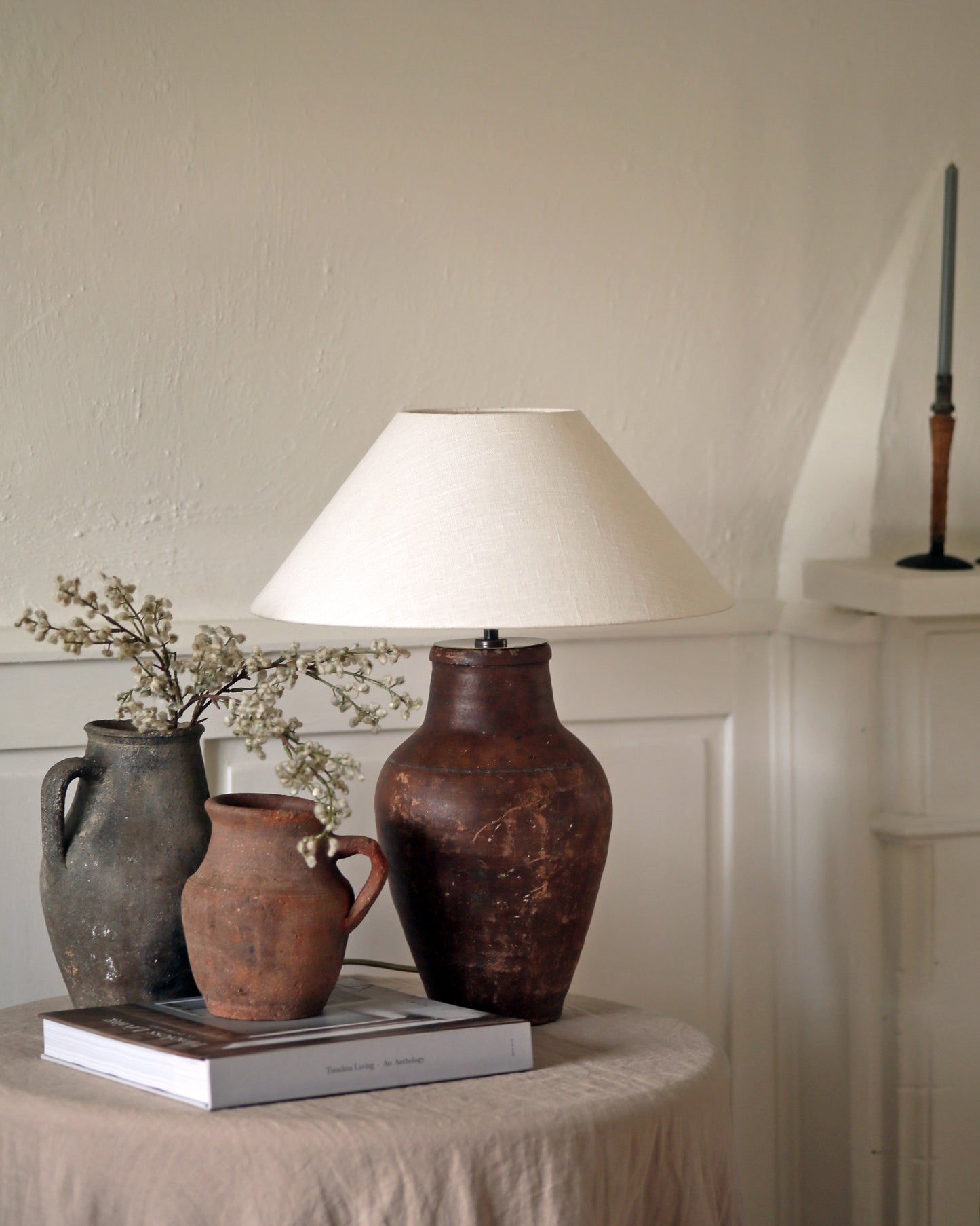 Collection of antique terracotta pots with pot converted to antique table lamp base