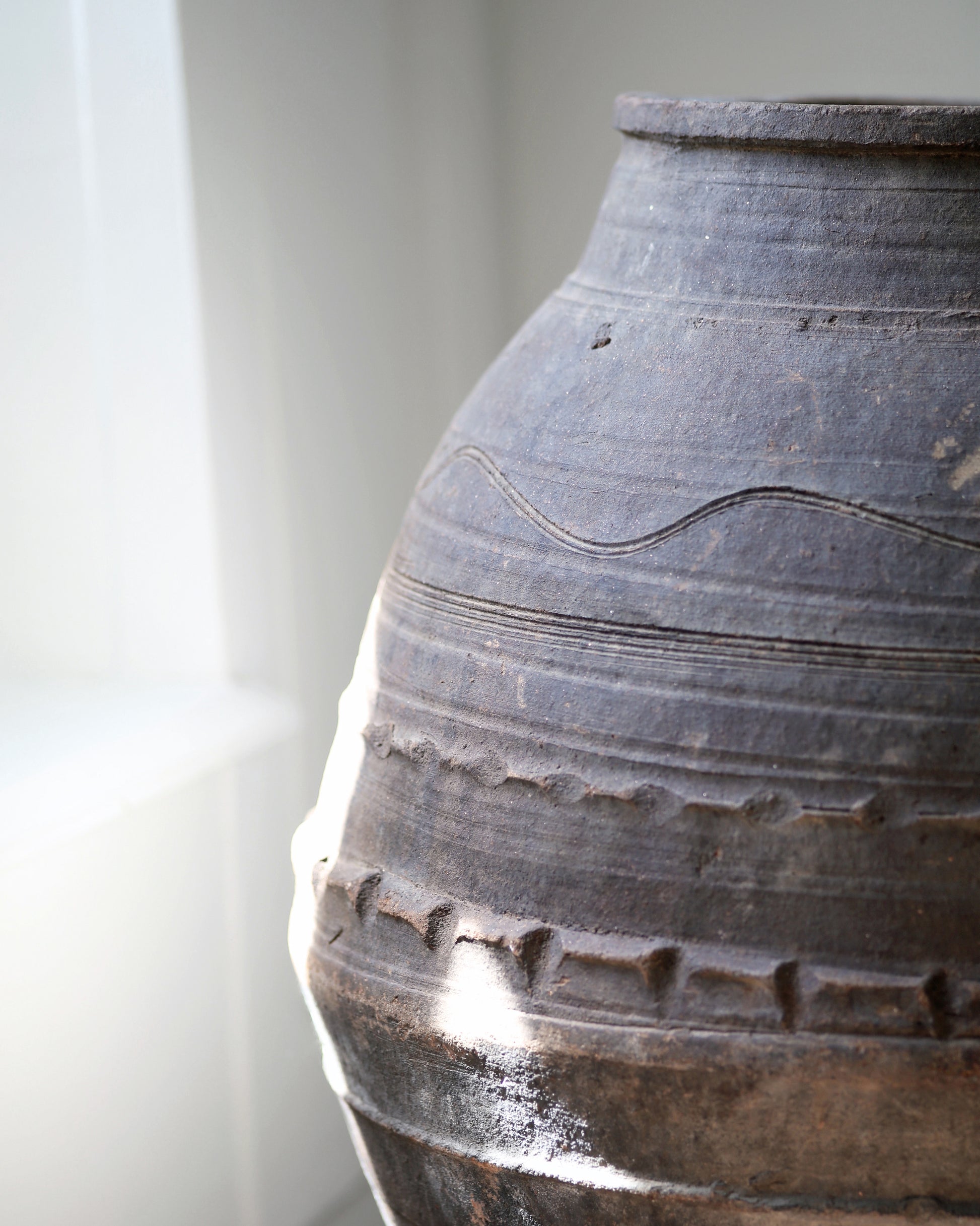 Antique olive jar with highly decorative detail 