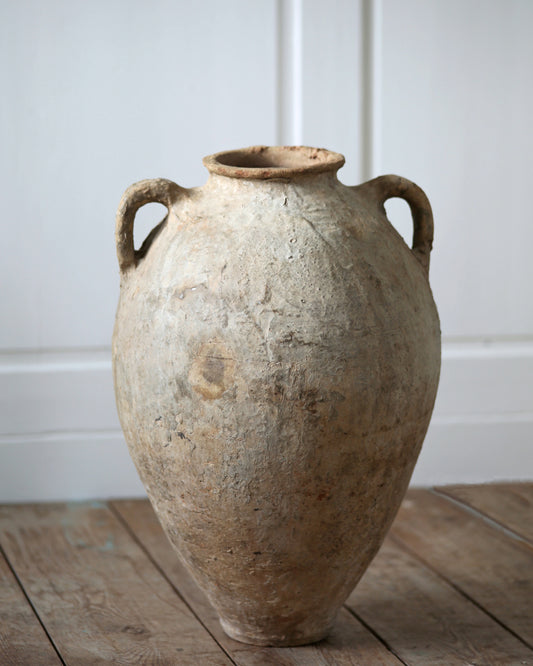 Decorative statement floor standing urn with lots of texture