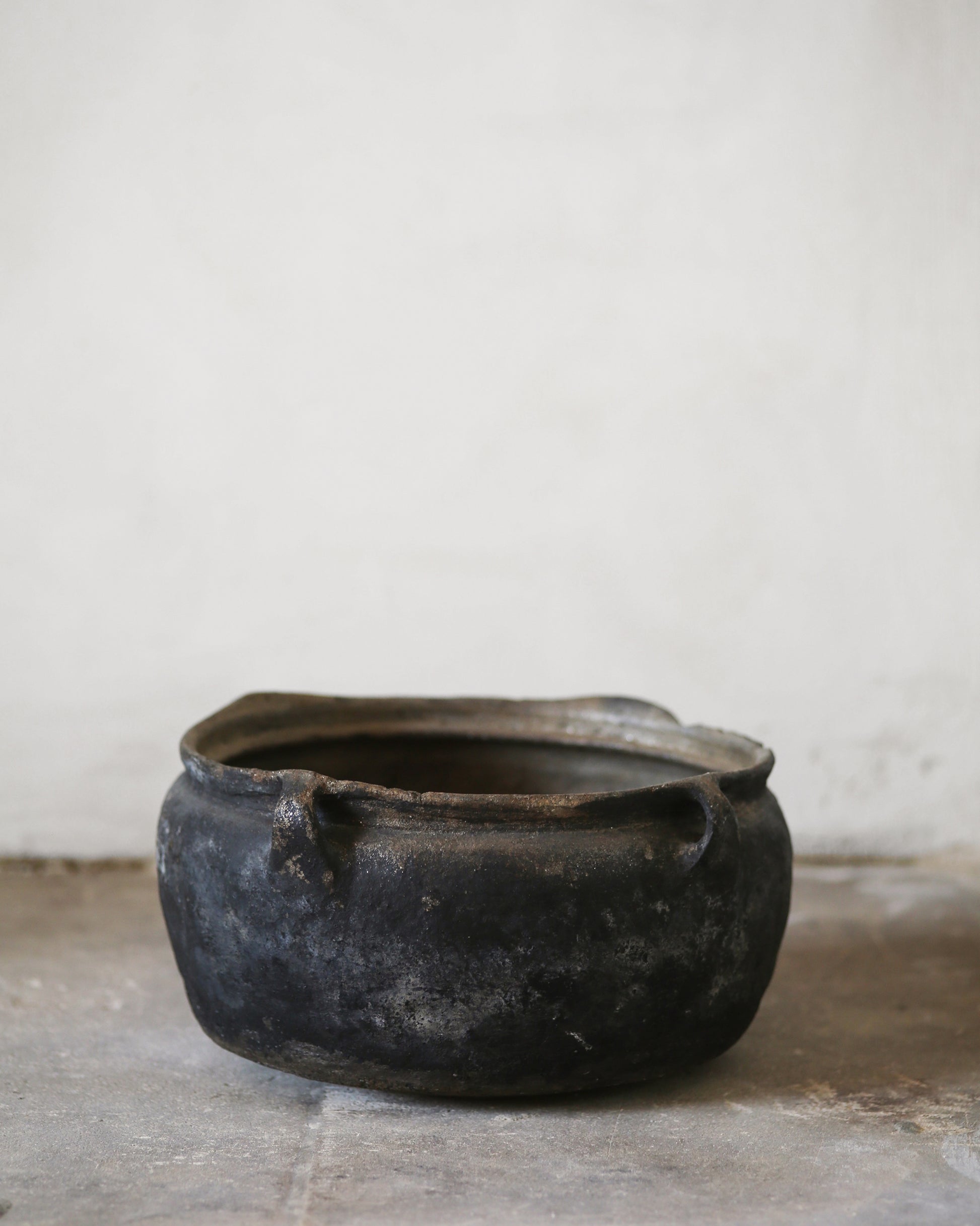 Blackened clay vintage bowl