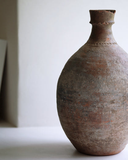 Antique rustic pottery piece to use as vase
