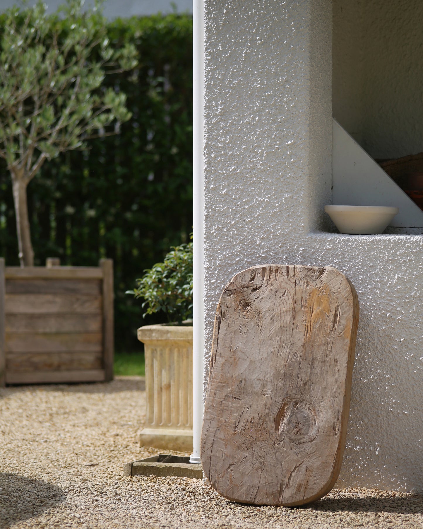 Huge wooden bread board for al fresco dining with guests