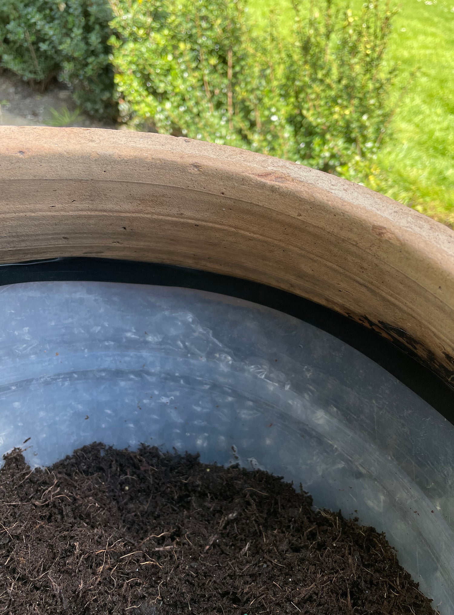 Planting guide for antique terracotta garden pot - using plastic pot liner