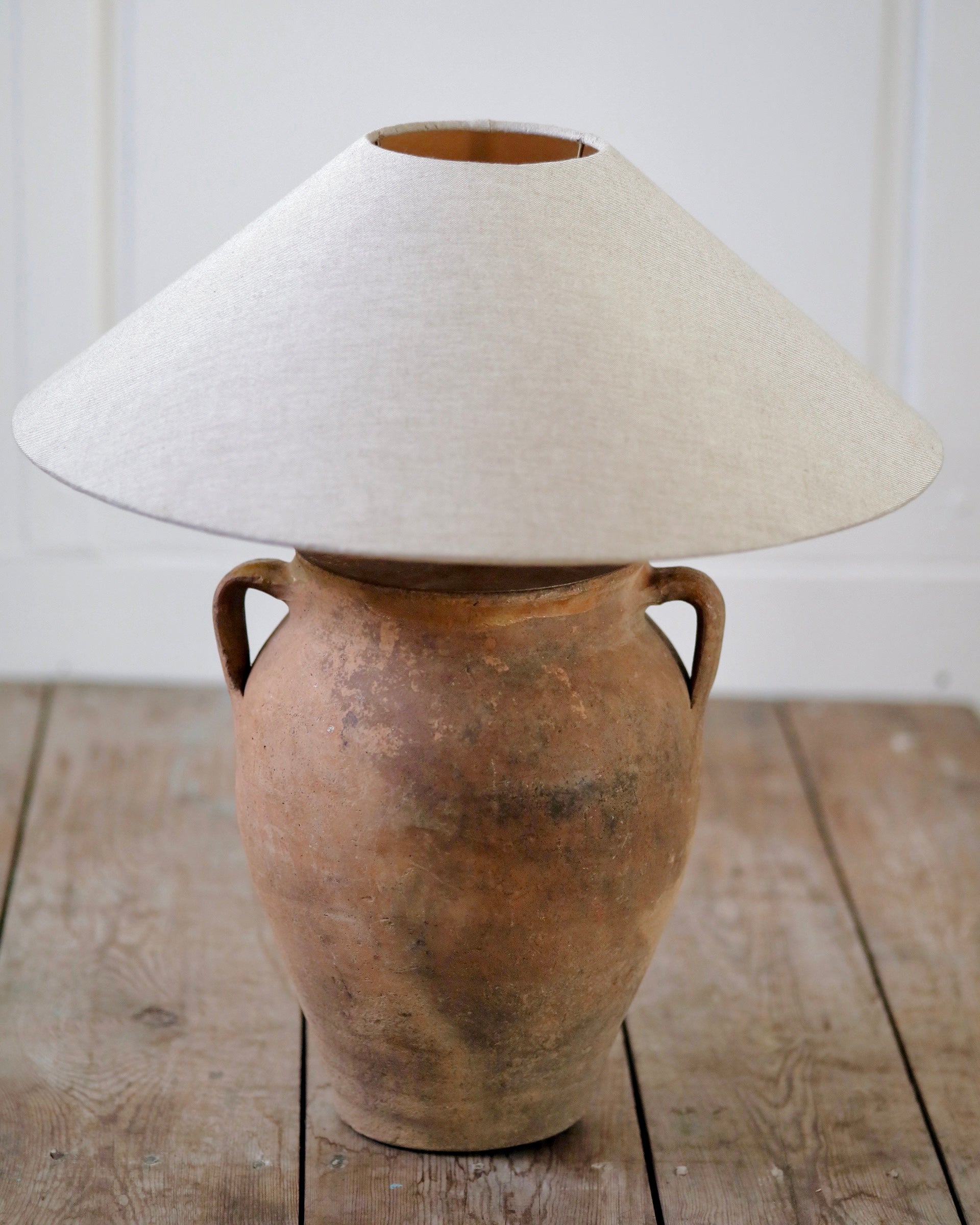 Natural aged patina on antique clay olive pot converted to lamp