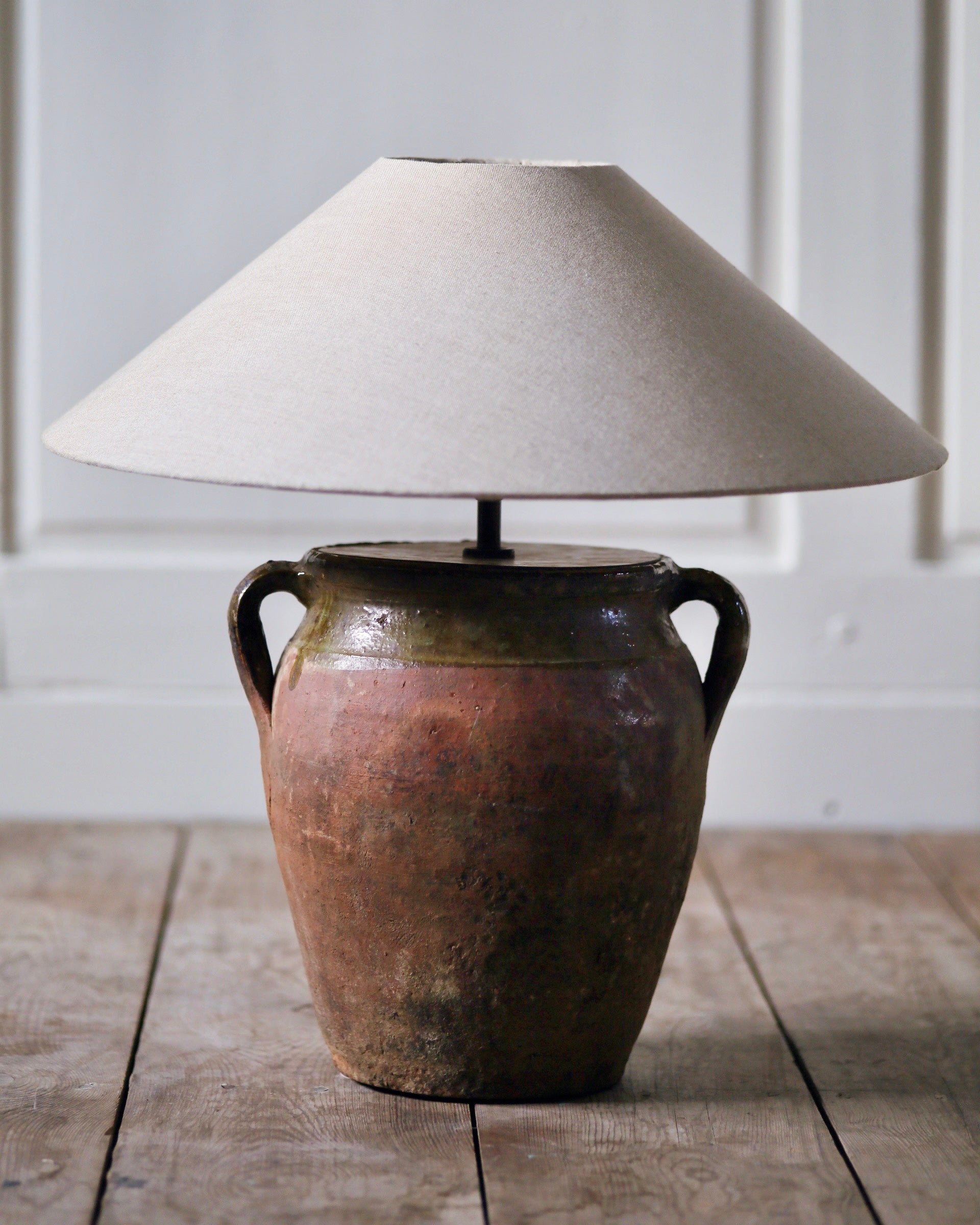 Terracotta and green glaze pot with handles converted to table lamp