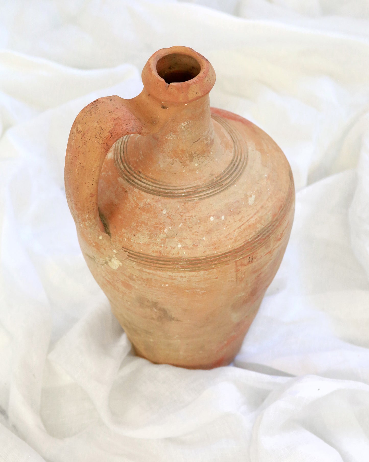 Funnel neck top of Mediterranean terracotta pot