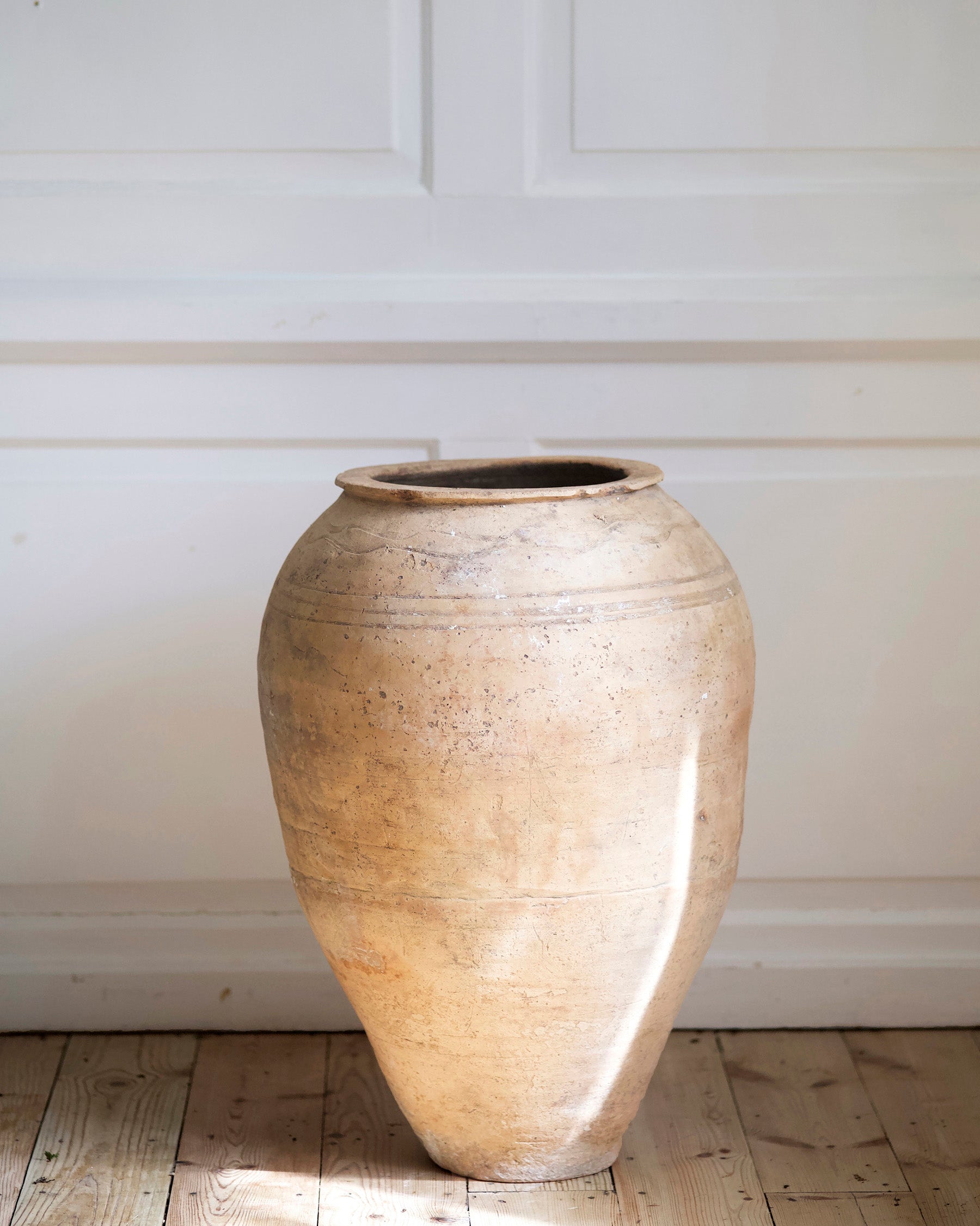 Medium sized terracotta urn