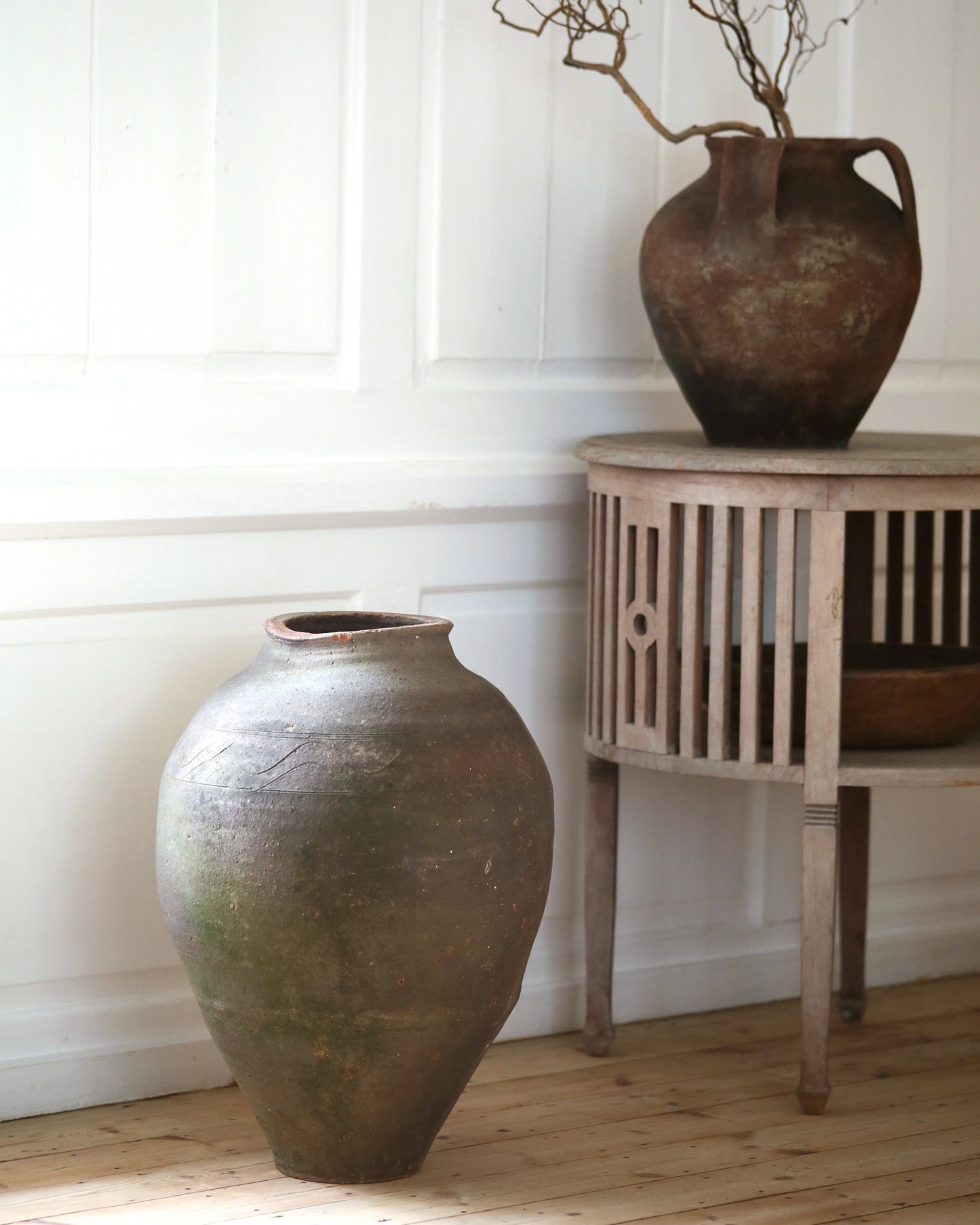 Dark brown patina terracotta urns