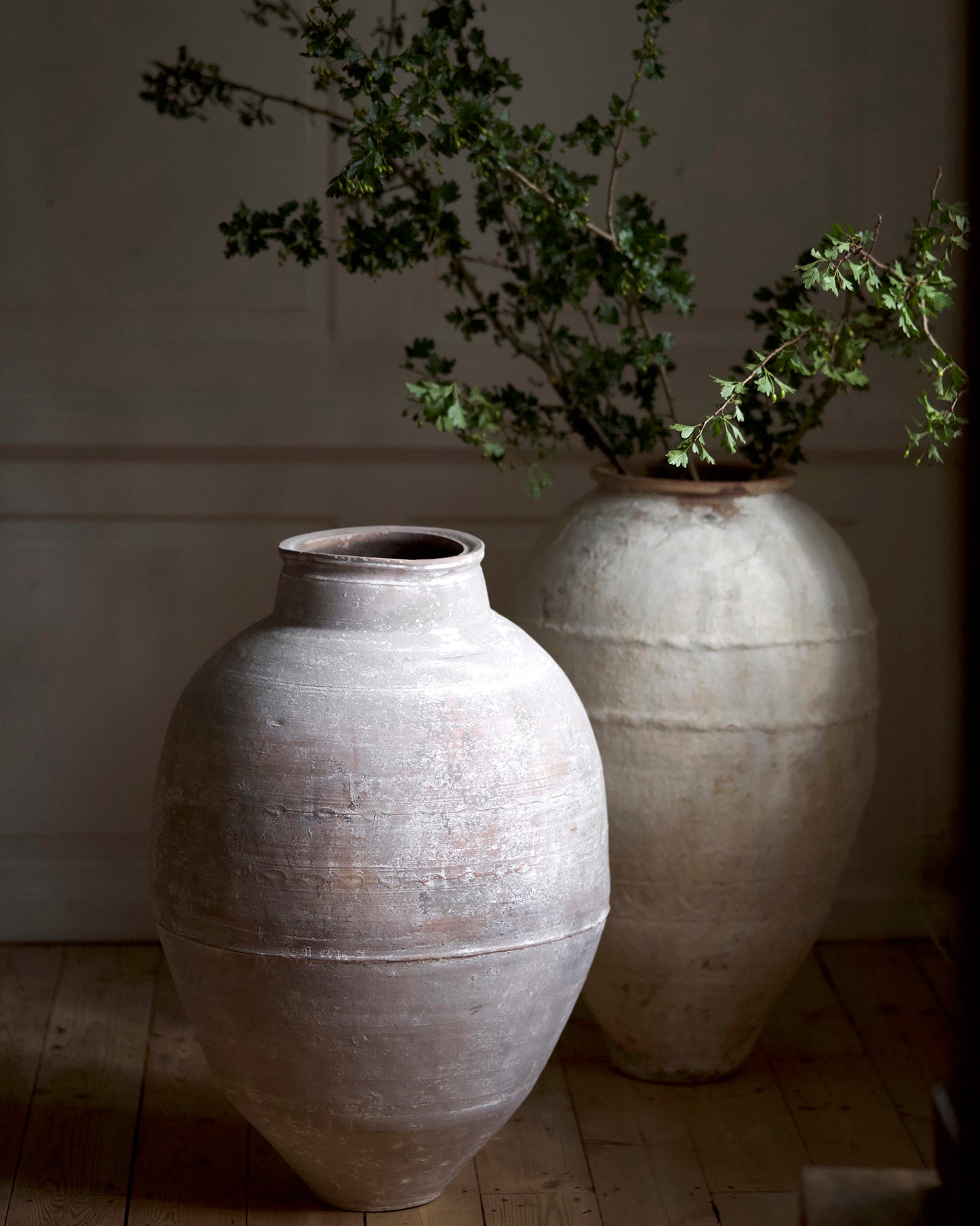 Pair of large white textured olive pots