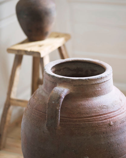 Decorative terracotta details of urn