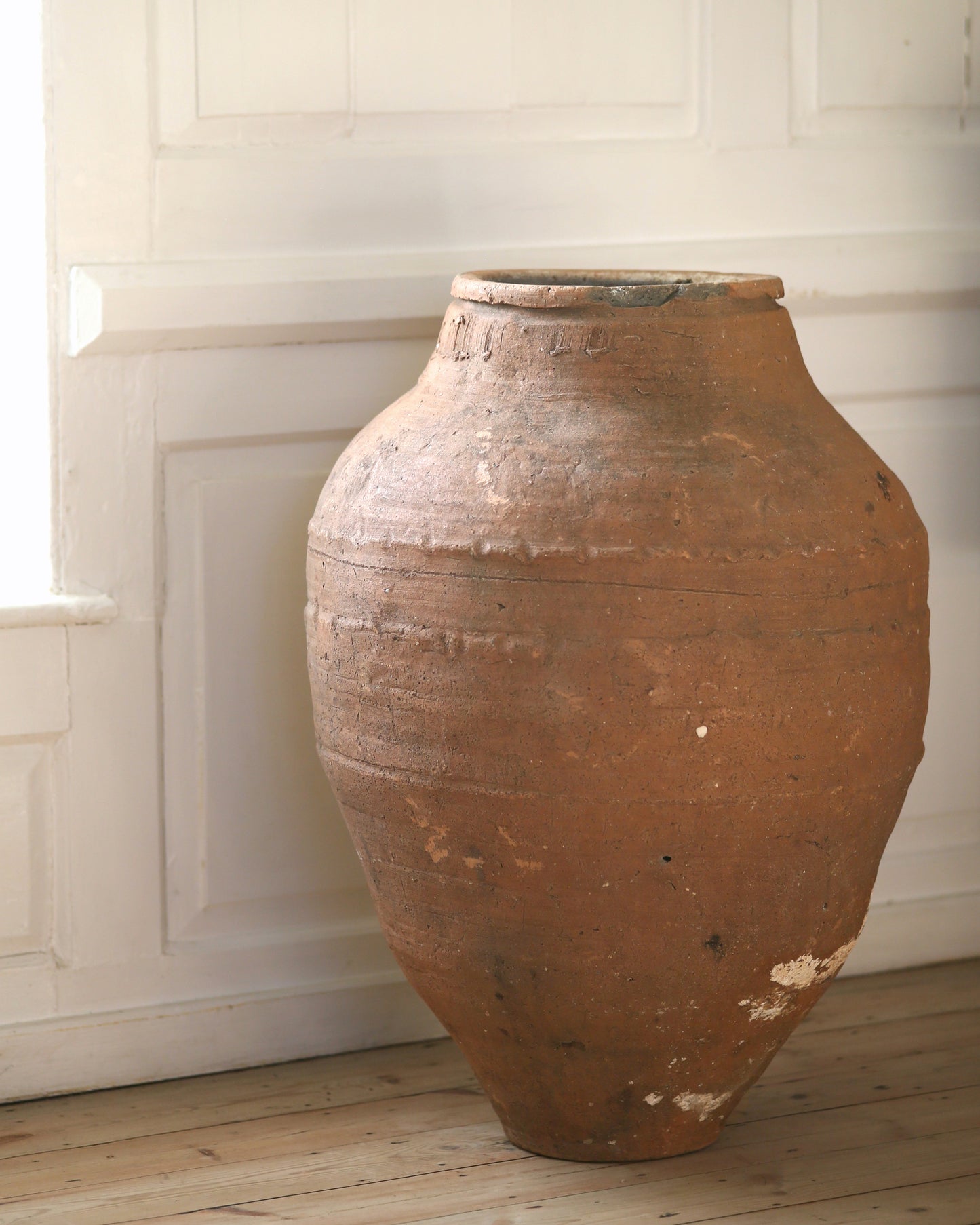 Side of pot showing original texture and patina