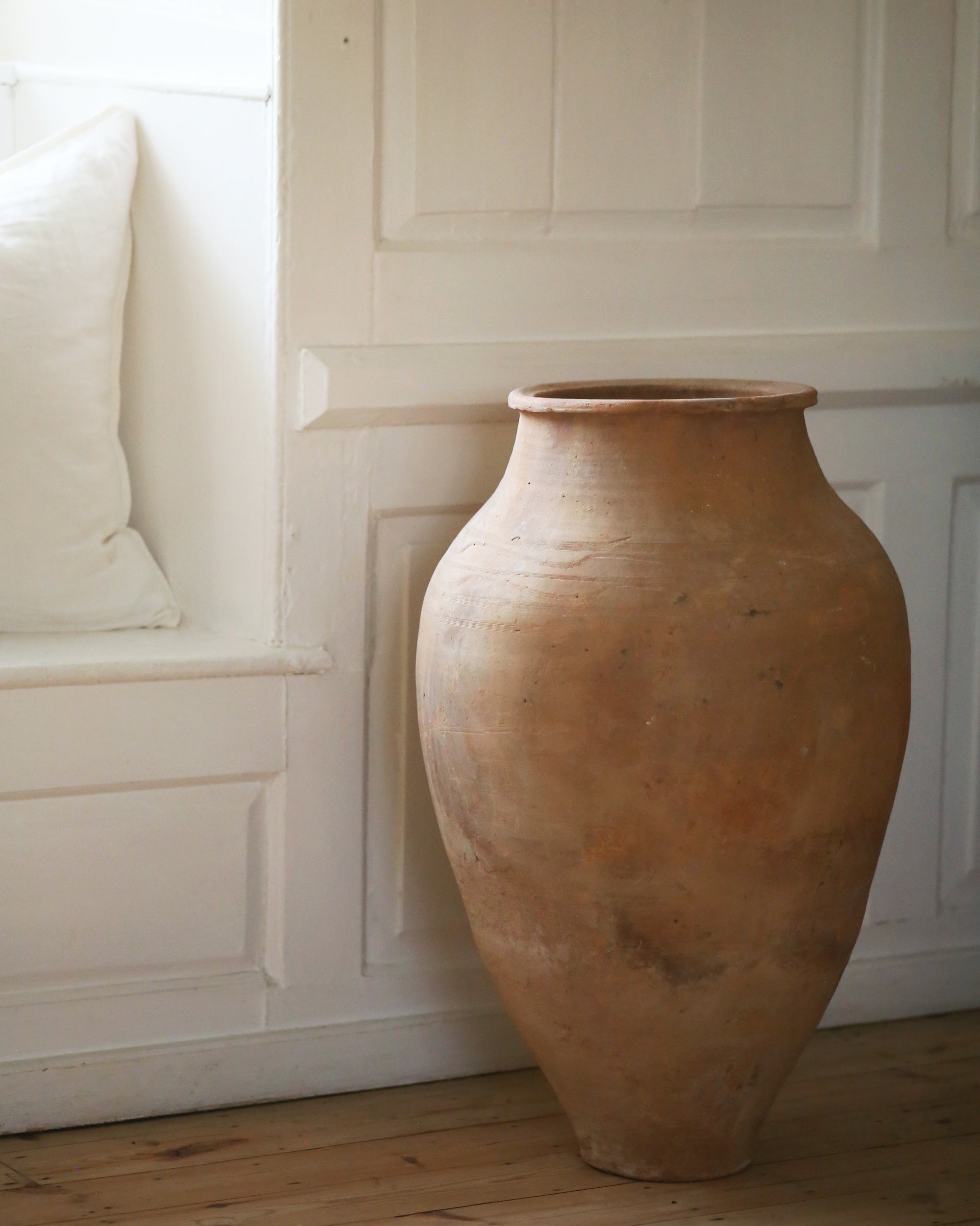 Tall slim antique terracotta pot