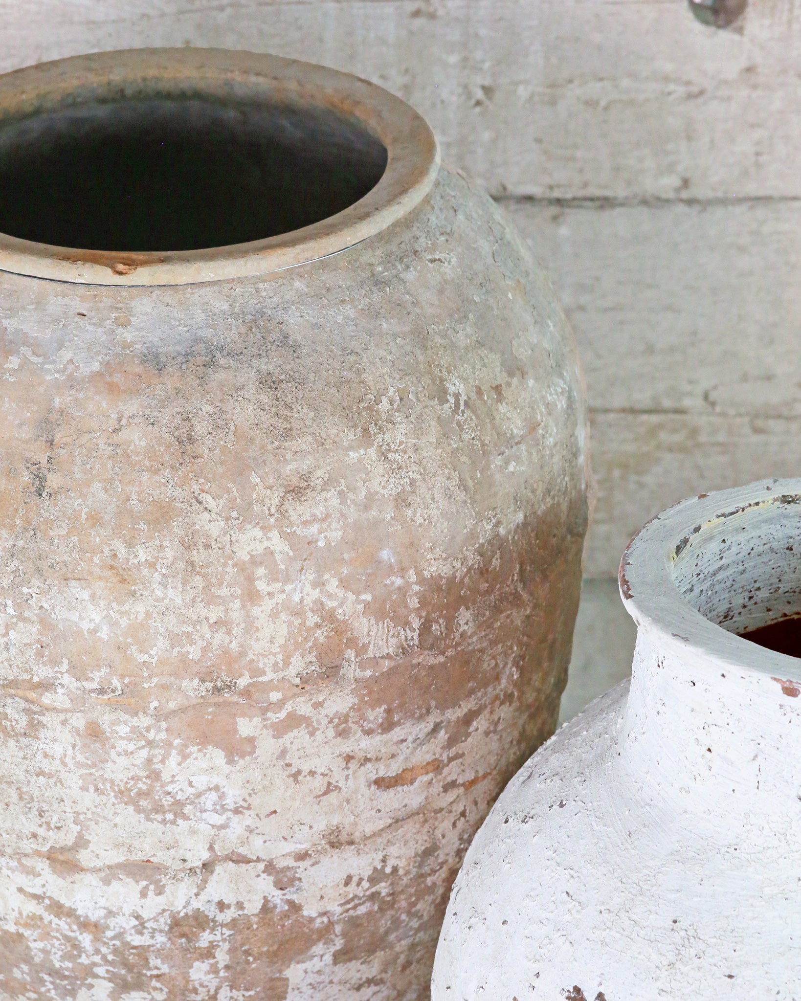 Close up of rustic textured finish to original olive pot
