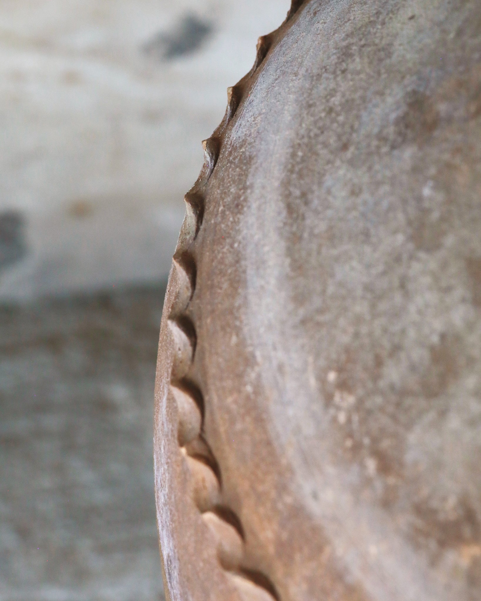 Artisan handmade pottery detail on terracotta urn