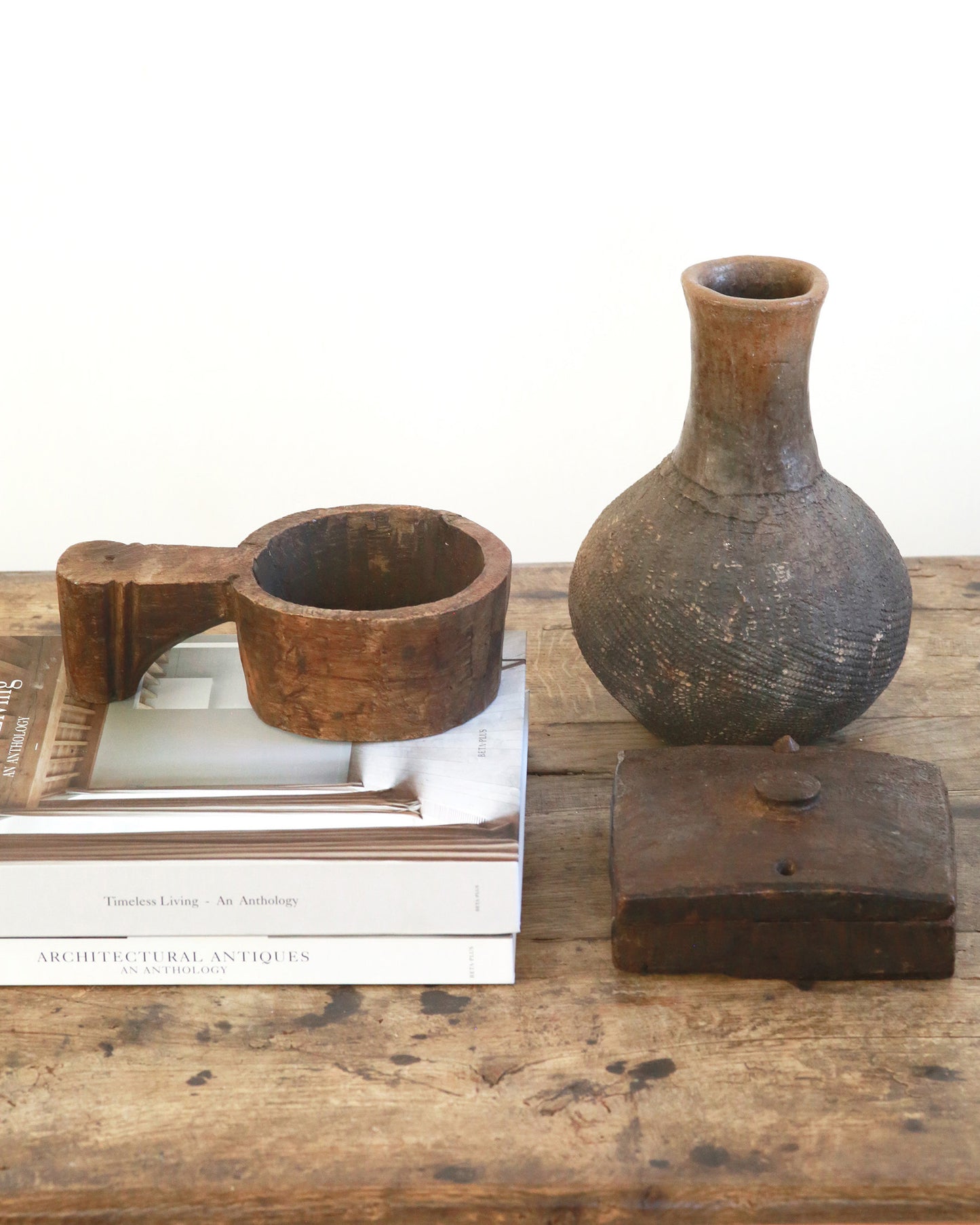 Coffee table styling of antique wooden accessories