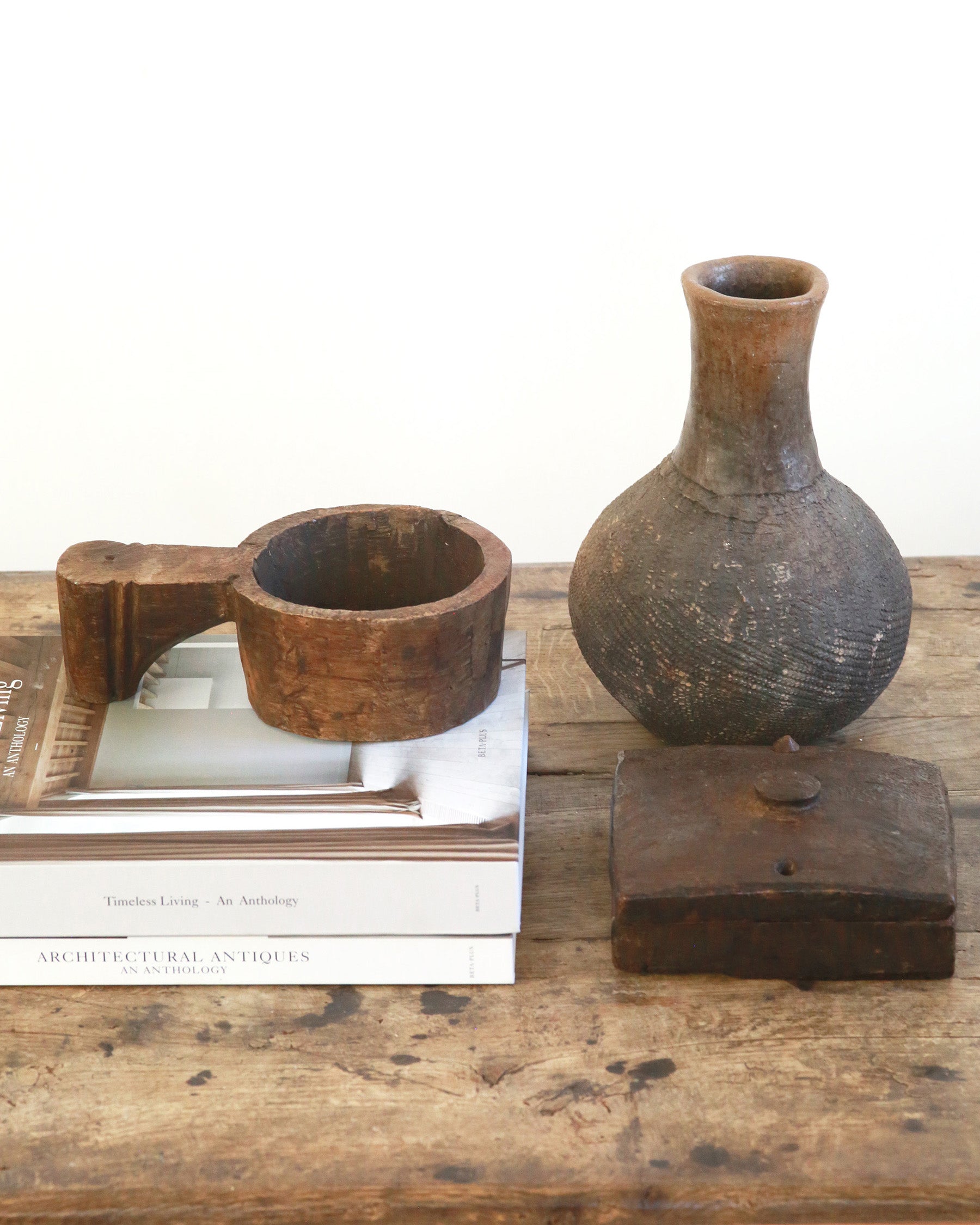 Coffee table styling of antique wooden accessories
