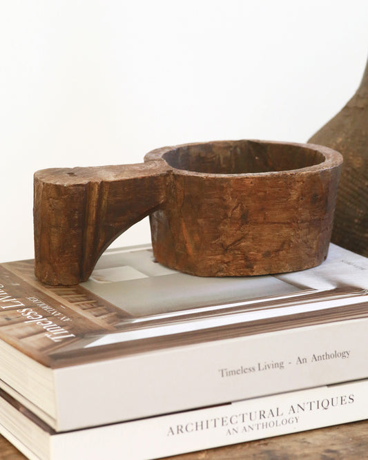 Wooden mortar bowl with carved handle