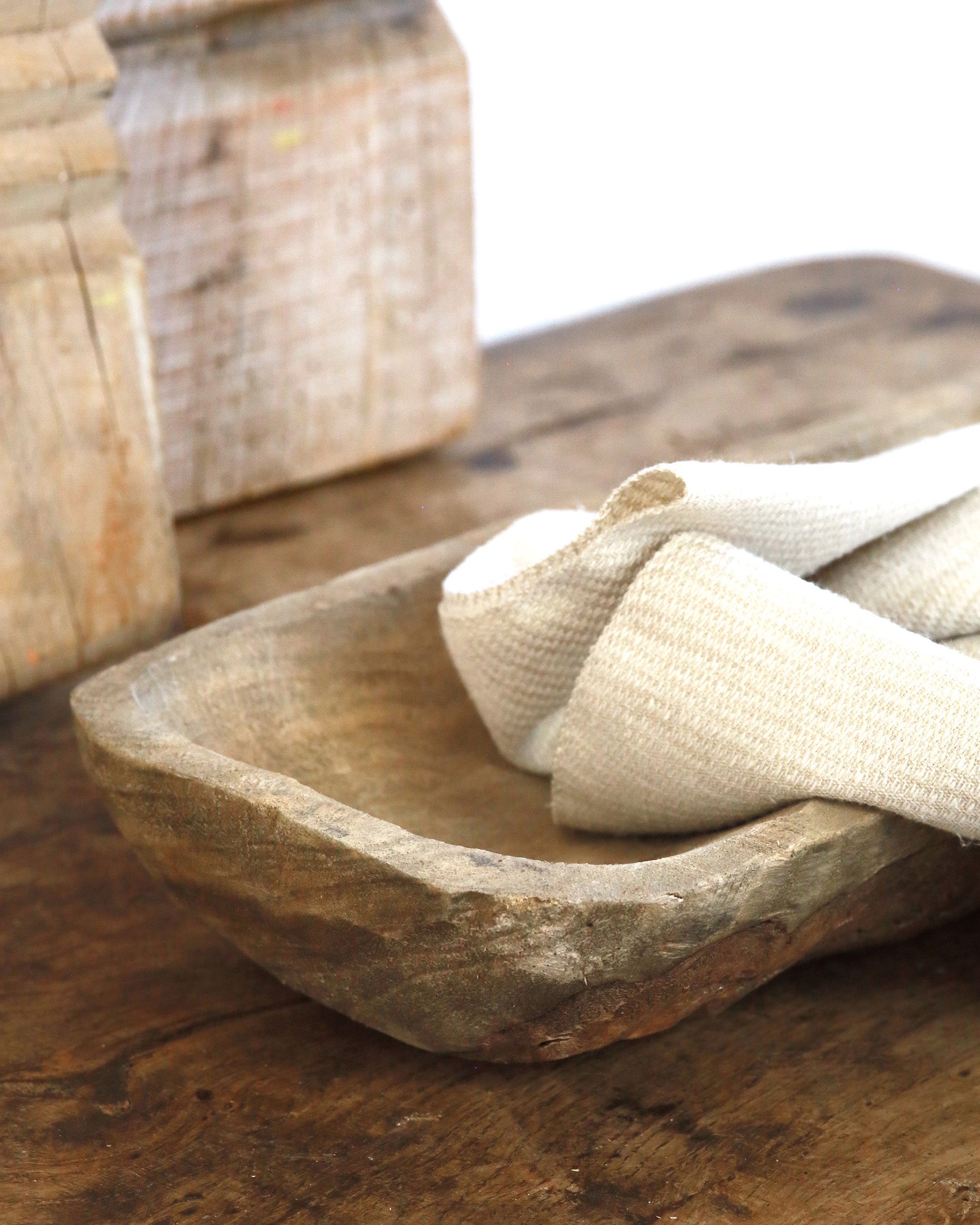 Close up detail of Hand carved raw wood tray