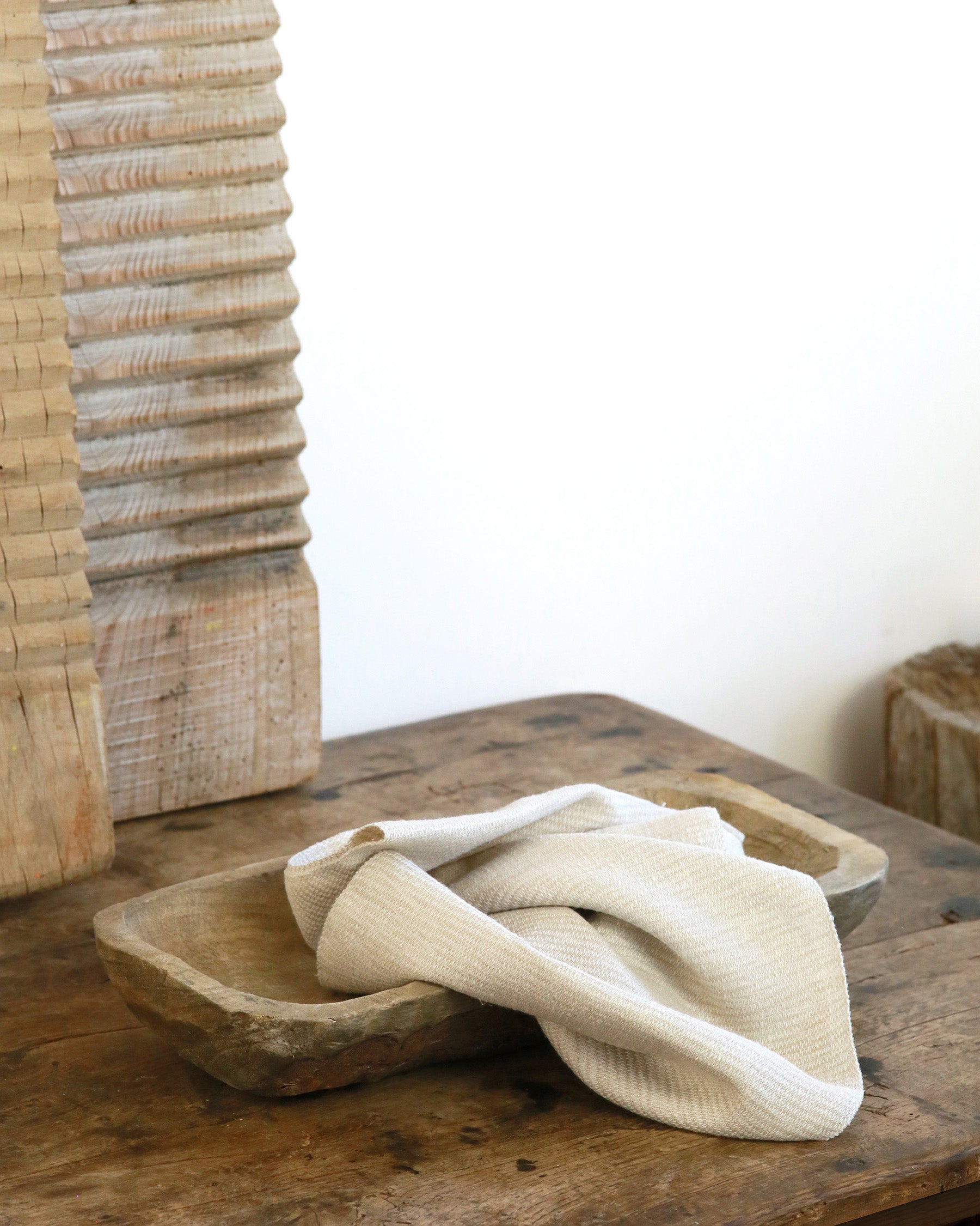 Hand carved raw wood tray with cloth