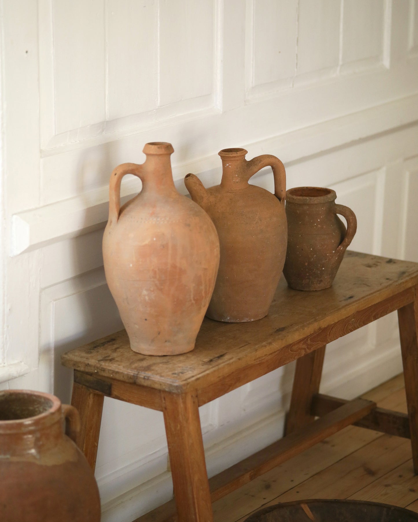 Grouping of warm terracotta antique pots