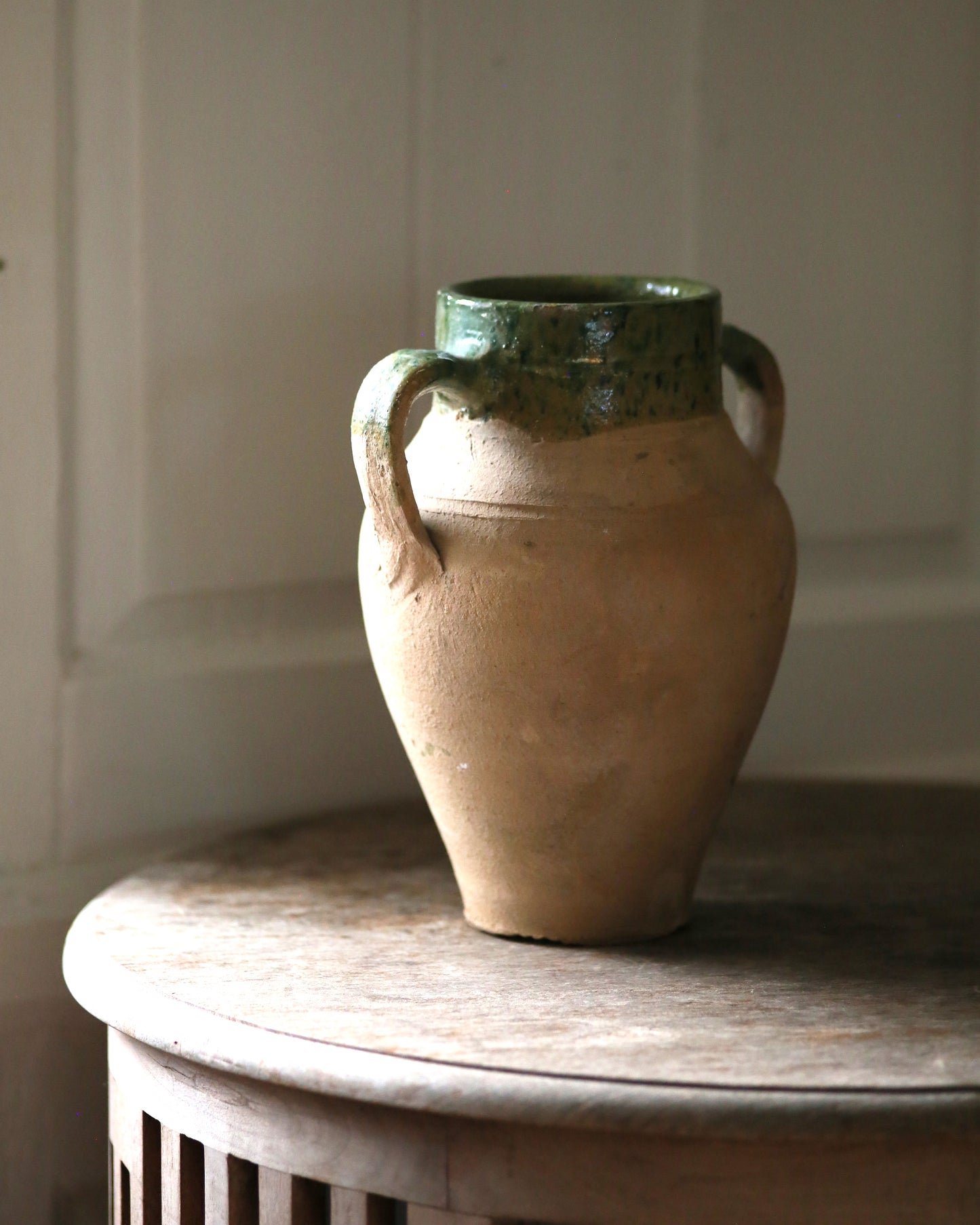 Antique terracotta pot with painted detail