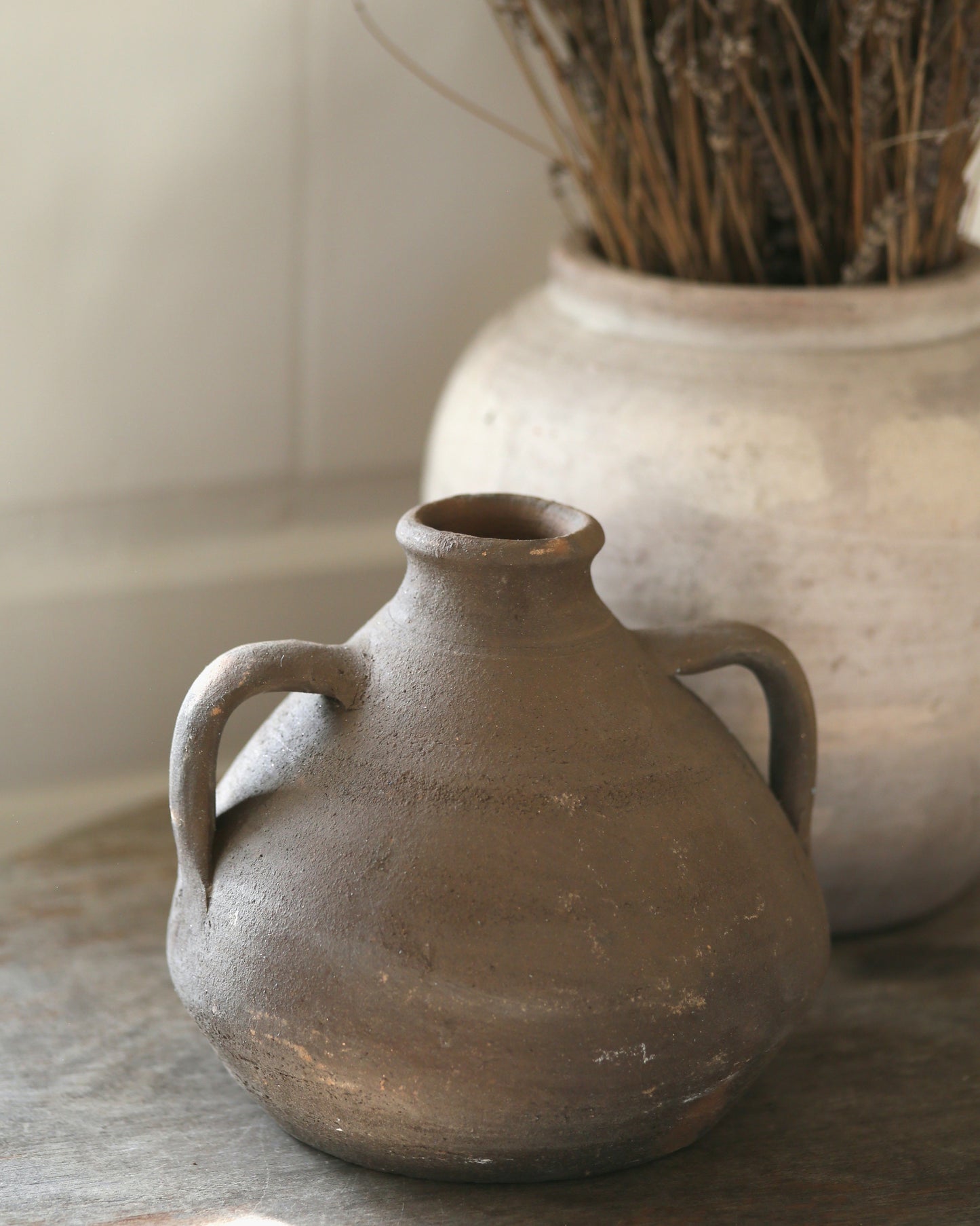 Antique handled pot for display vase