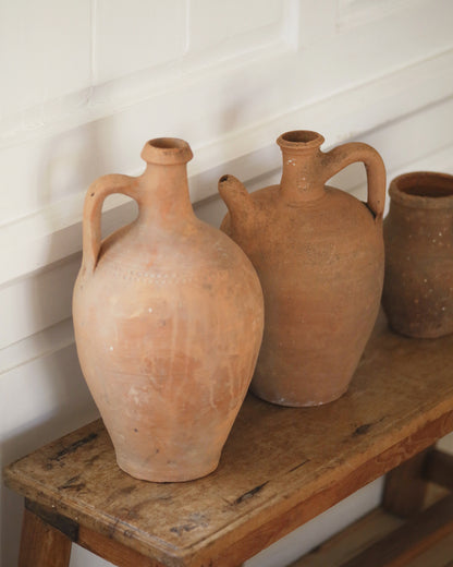 Group of warm terracotta homeware pots