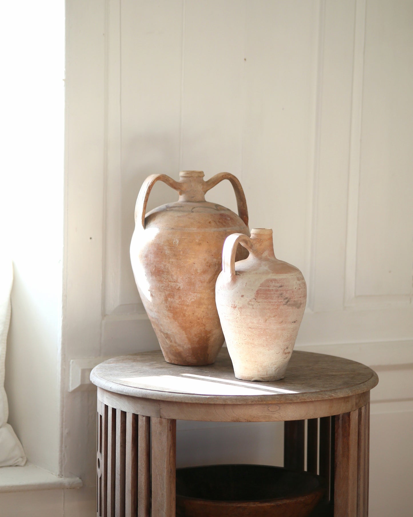 Antique terracotta pots on table top