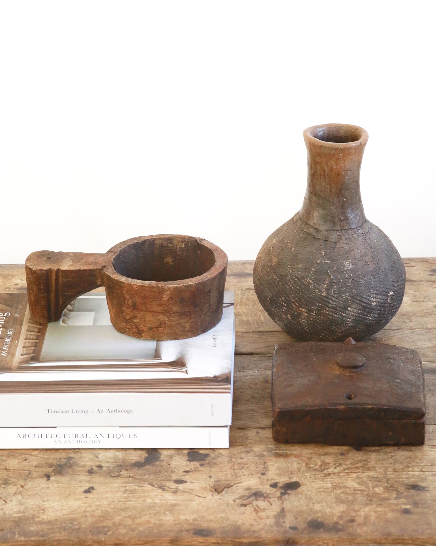 Coffee table styling of antique wooden accessories