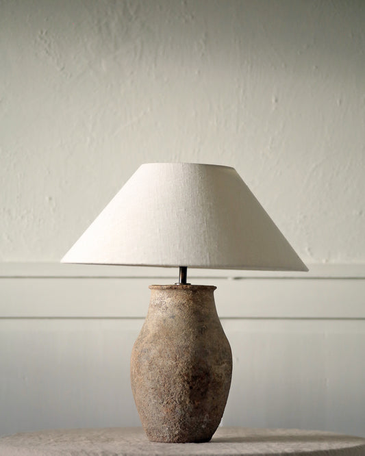 Antique textured vessel converted lamp base with linen lampshade