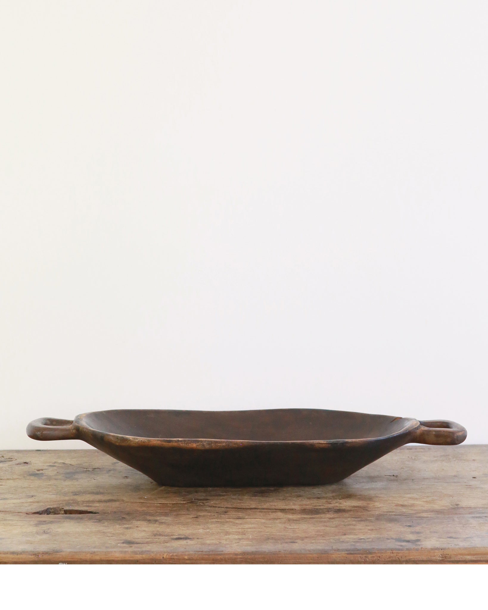 Vintage dark polished wooden bowl with handles