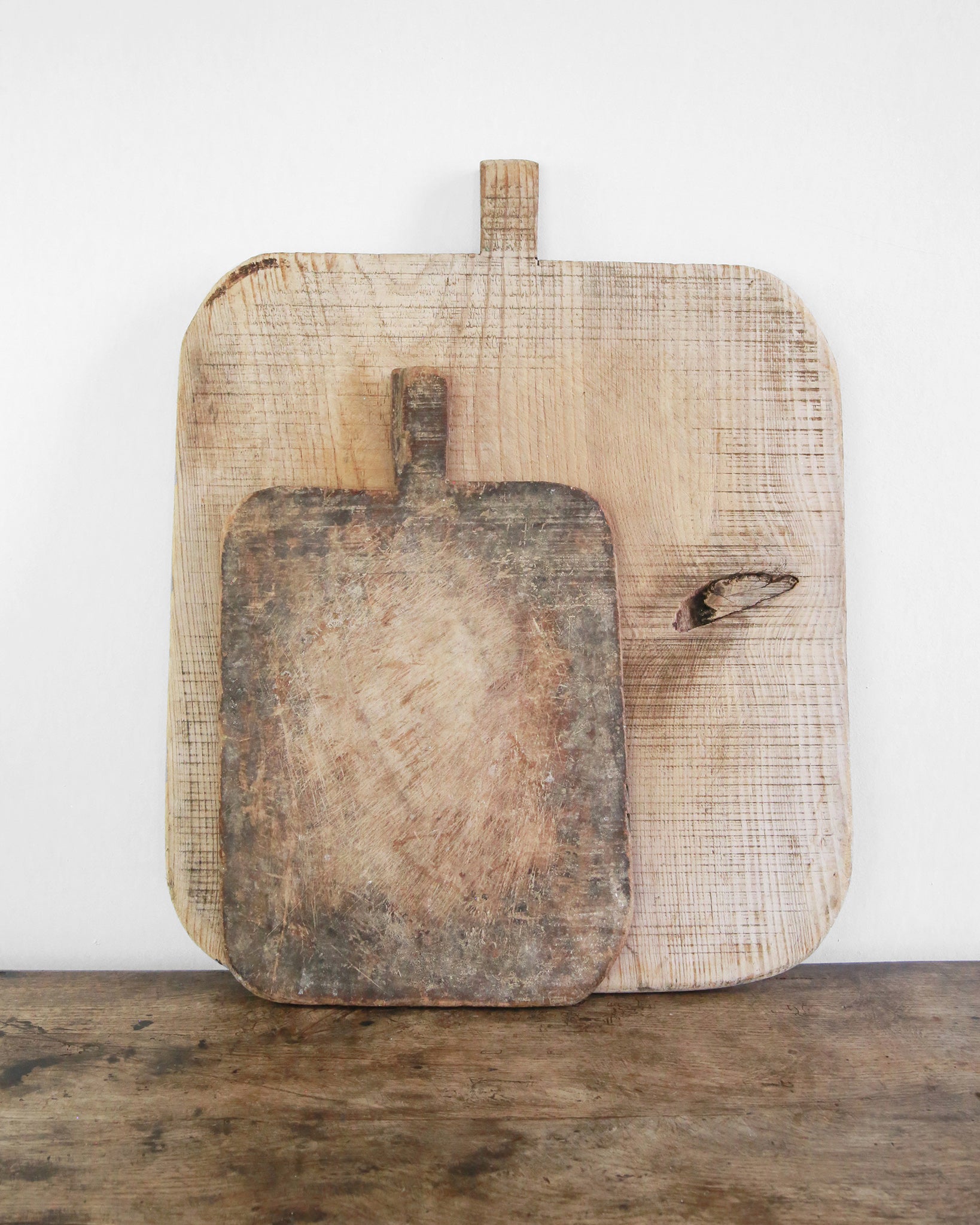 Wooden chopping board with rustic patina