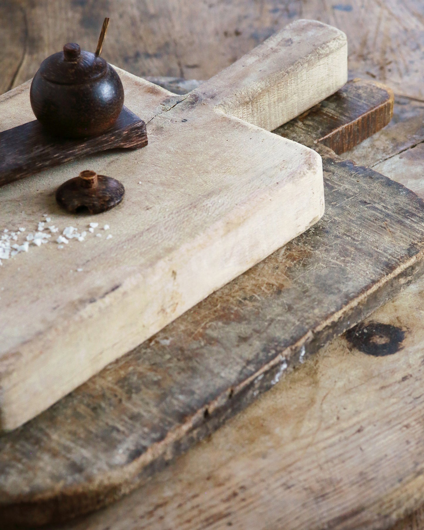 Thick wooden chopping board with kitchen styling