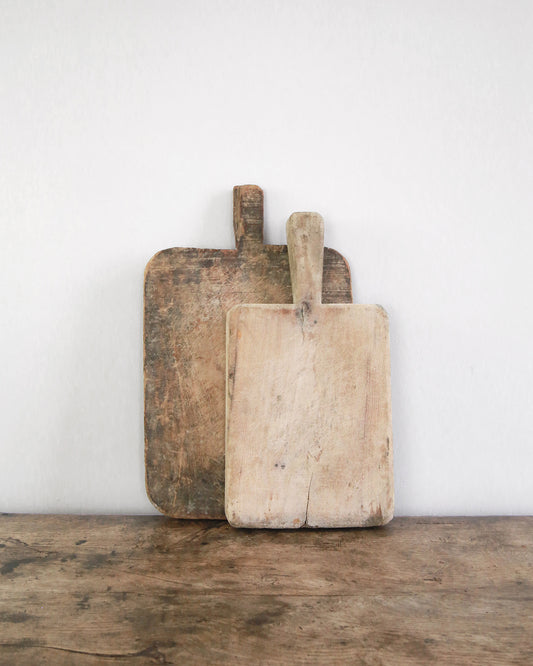 Original rustic wooden chopping boards in contrasting natural shades