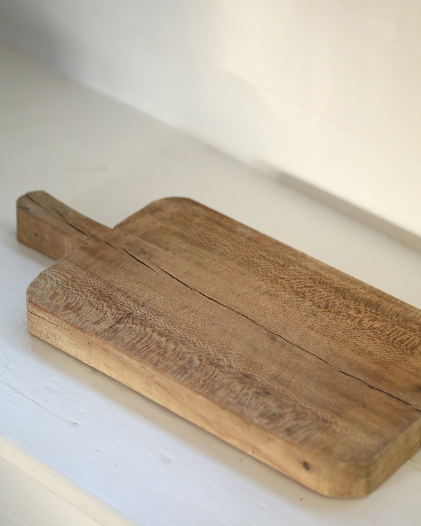 Rustic aged wooden rectangular chopping board