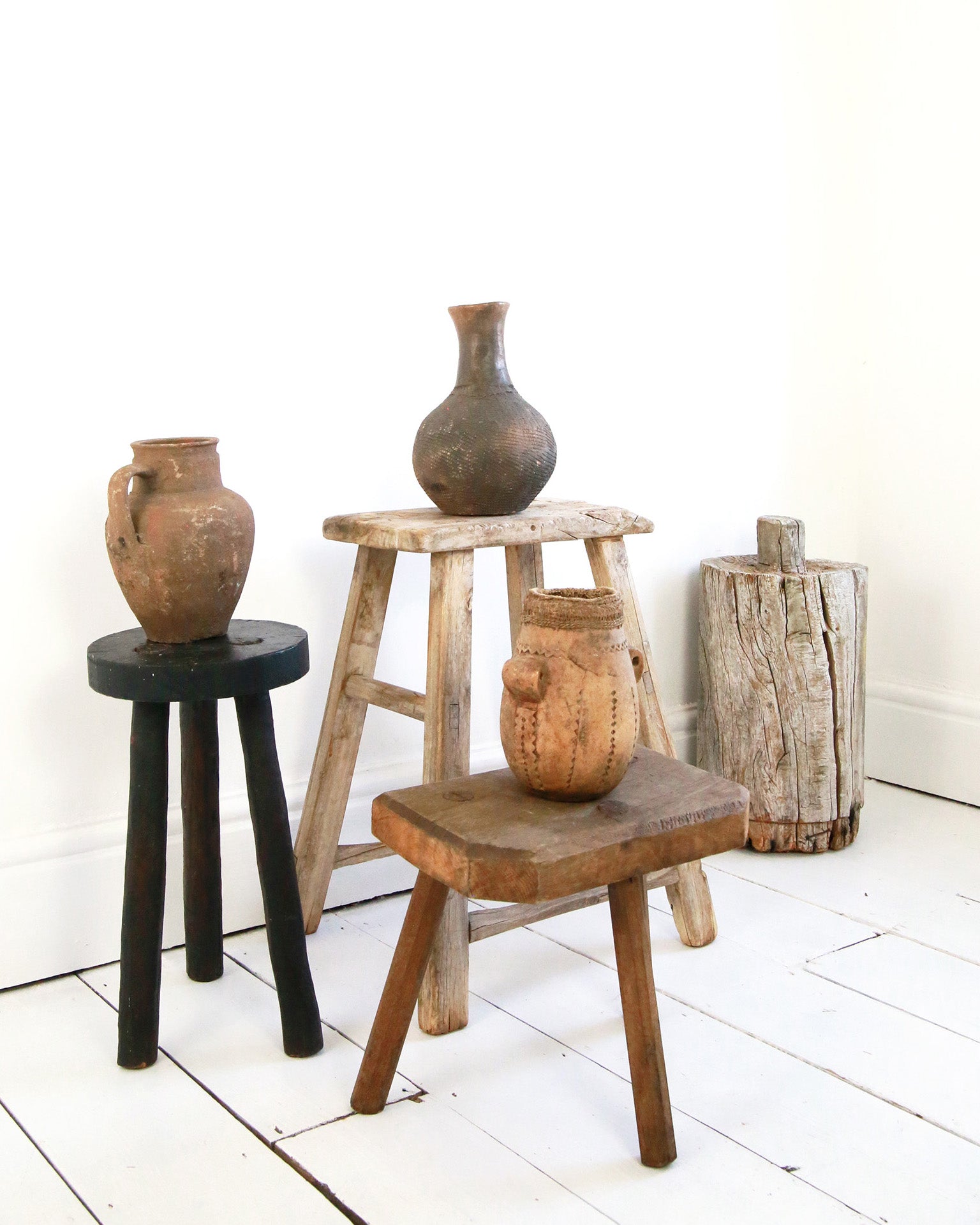 Display of Antique stools and vases
