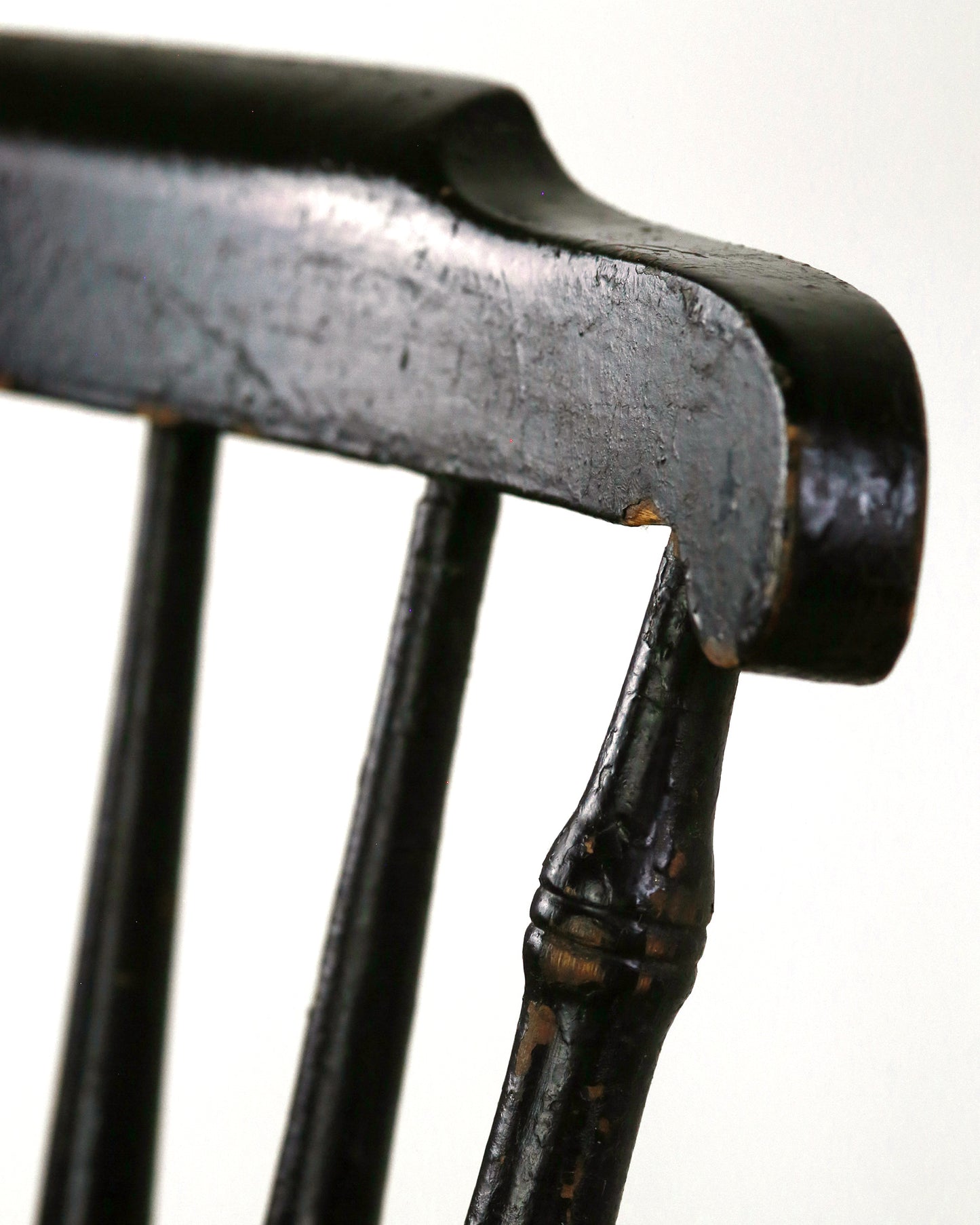 Black paint detail of penny seat back