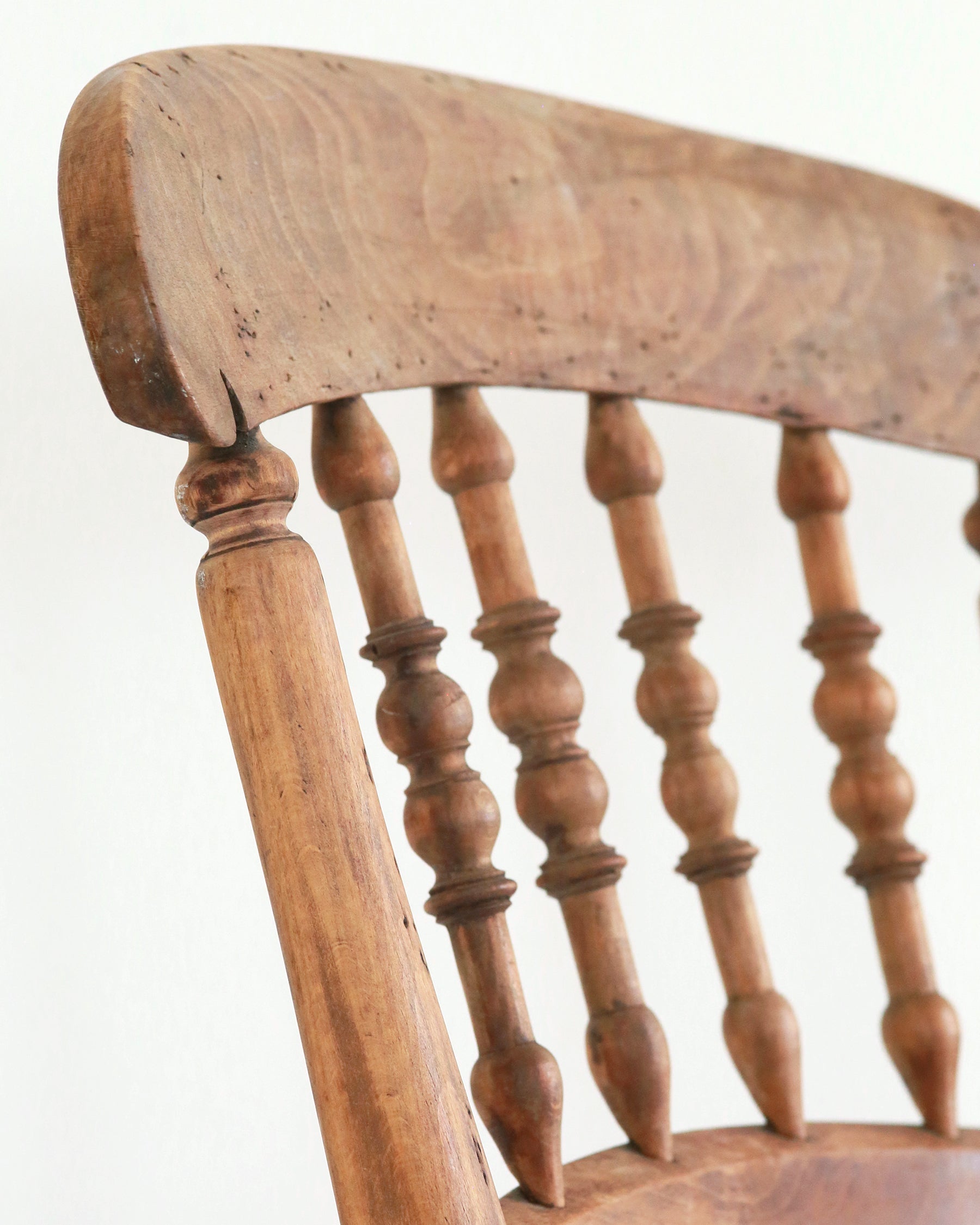 Rocking chair carved wood spindles